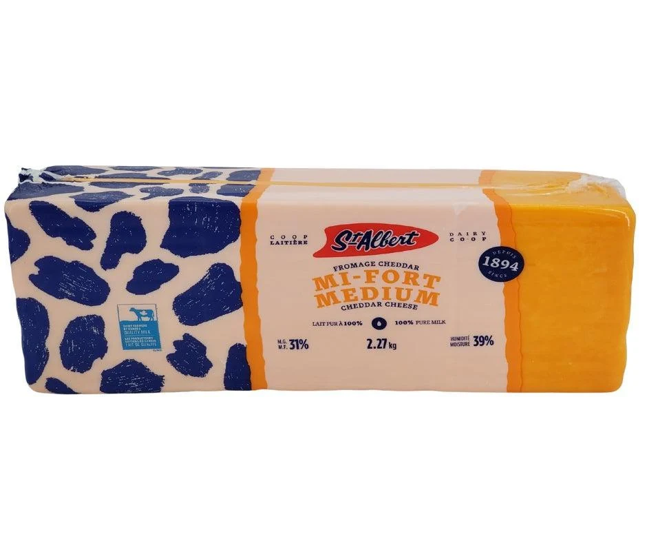 St. Albert - Distinction Cheddar - Color - Cheese — Each (2.27 KG)